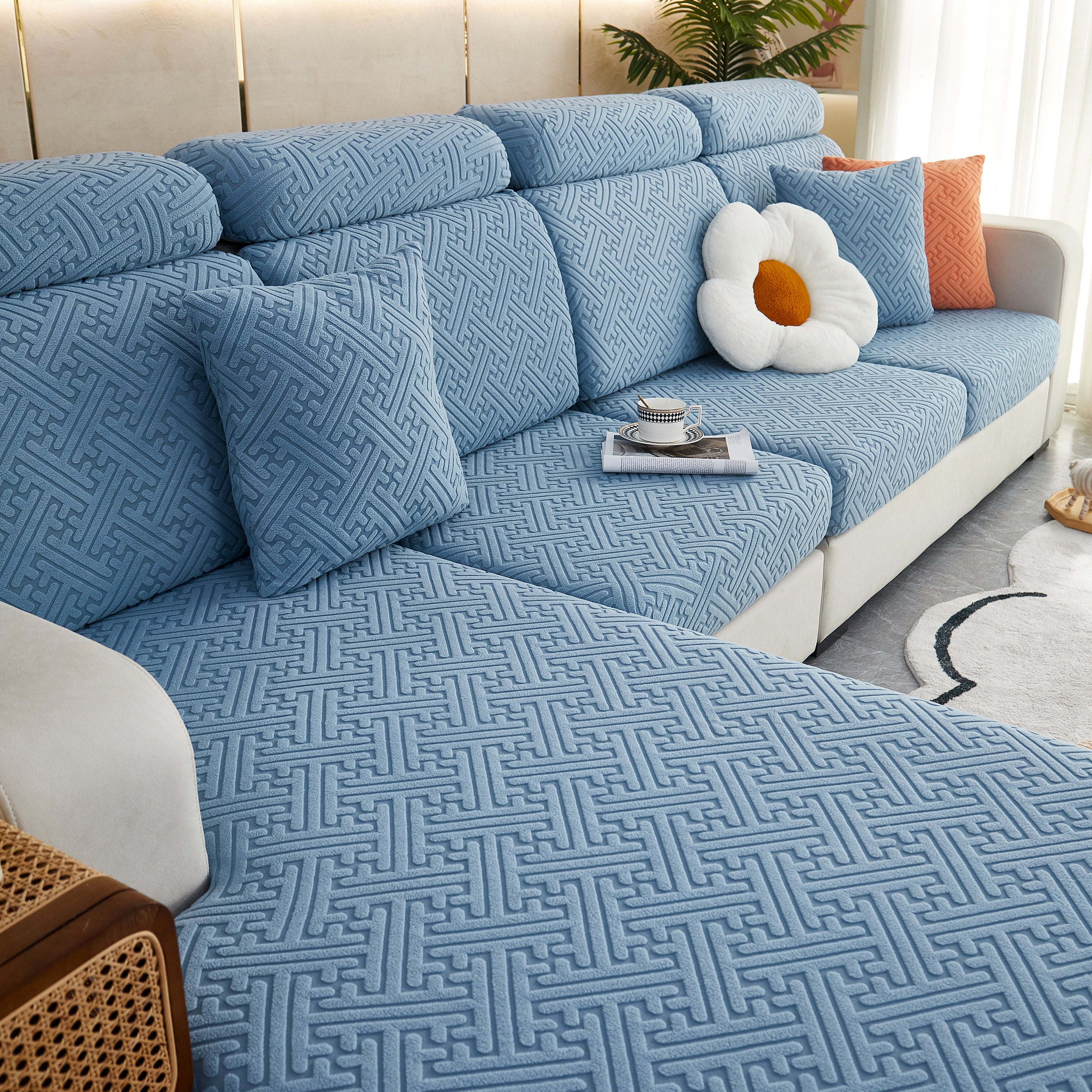 Bank met FancySofas Urban bankhoezen in de kleur Ocean Blue, machinewasbaar, strak en stijlvol, bedekt de hele bank.