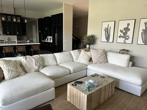Klantfoto van een bank met FancySofas Classic bankhoezen in de kleur Snow White.